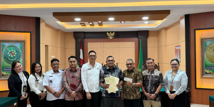 Kepala Kantah Bitung Hadiri Eksekusi Perkara Perdata Hendrik Warouw vs PT Pertamina